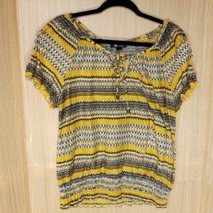 Yellow lightweight AB STudio top with boho print.